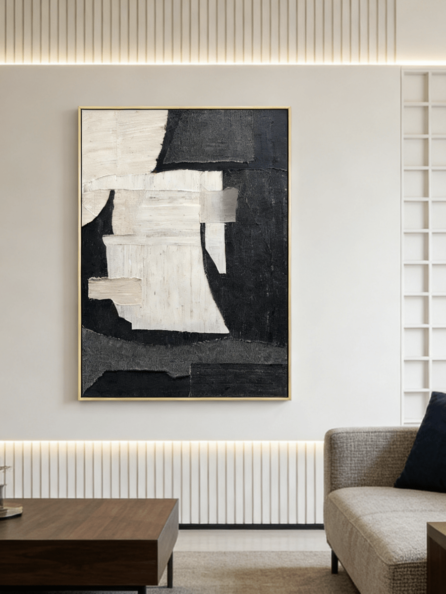 Large vertical hand-painted abstract painting with black and white textured blocks and fabric-like impasto by Seraphina Rose in a modern luxury living room.