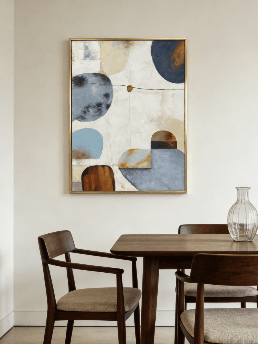 Hand-painted modern organic abstract painting featuring blue and brown geometric shapes with thick texture in a gold floater frame.