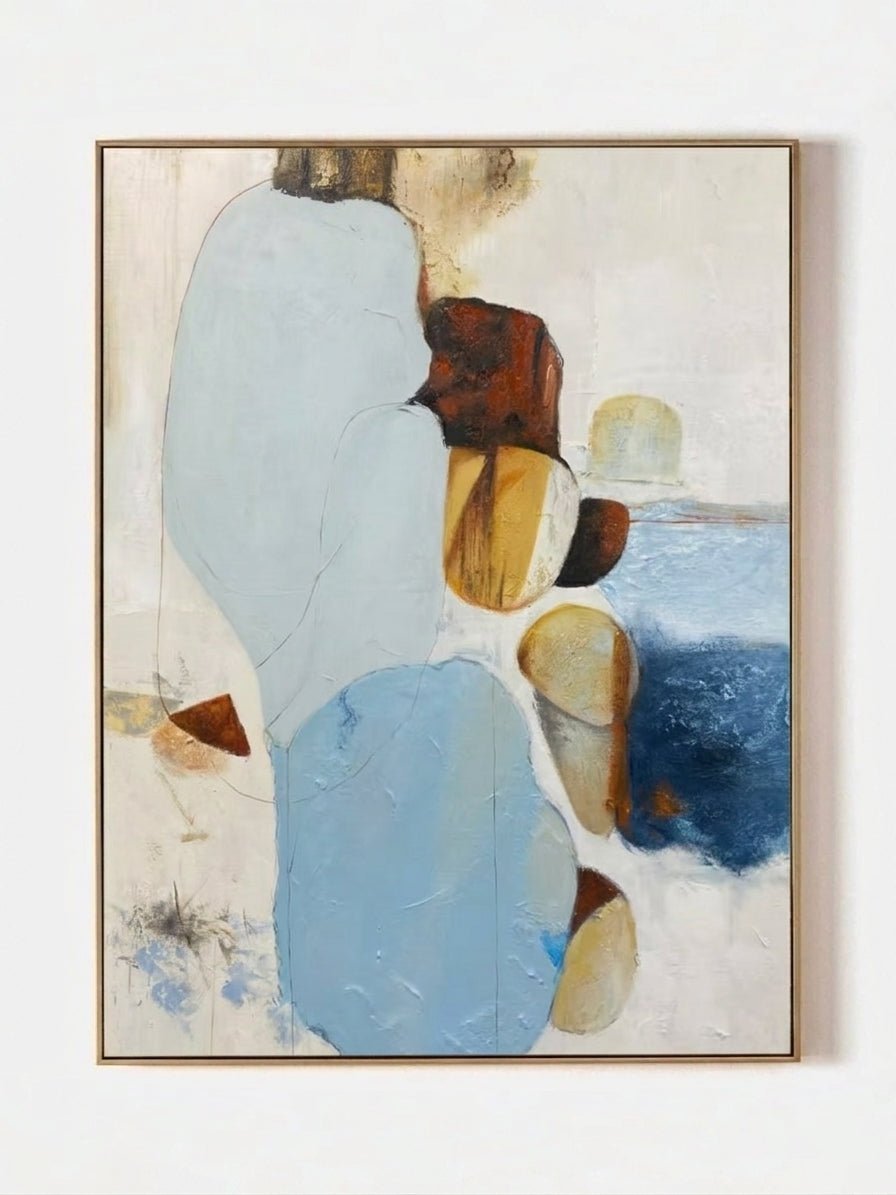 Hand-painted modern organic abstract painting featuring blue and brown stone-like shapes with heavy impasto texture in a gold frame.
