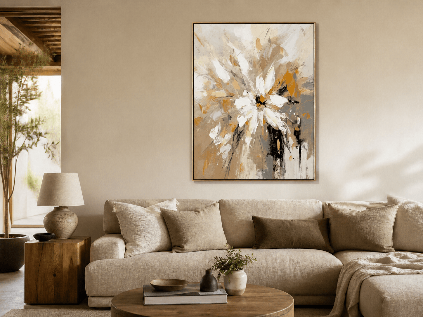Gold abstract floral wall art above a beige sofa in a warm living room