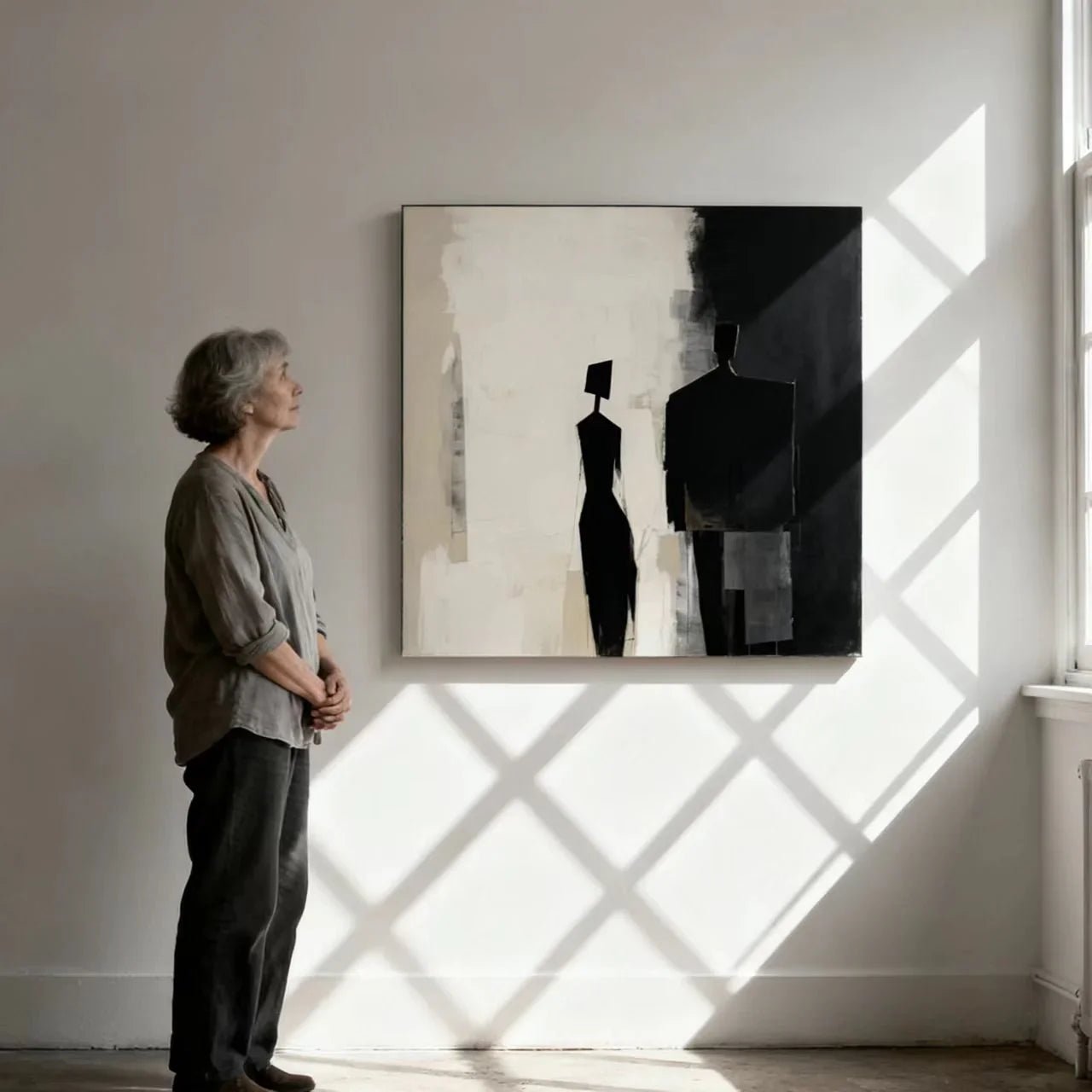 The golden ratio between the large hand-painted oil painting hanging behind the sofa and the furniture in the space.