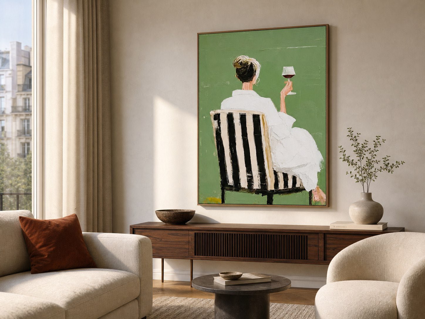 Modern feminine figurative wall art above a walnut console in a contemporary living room