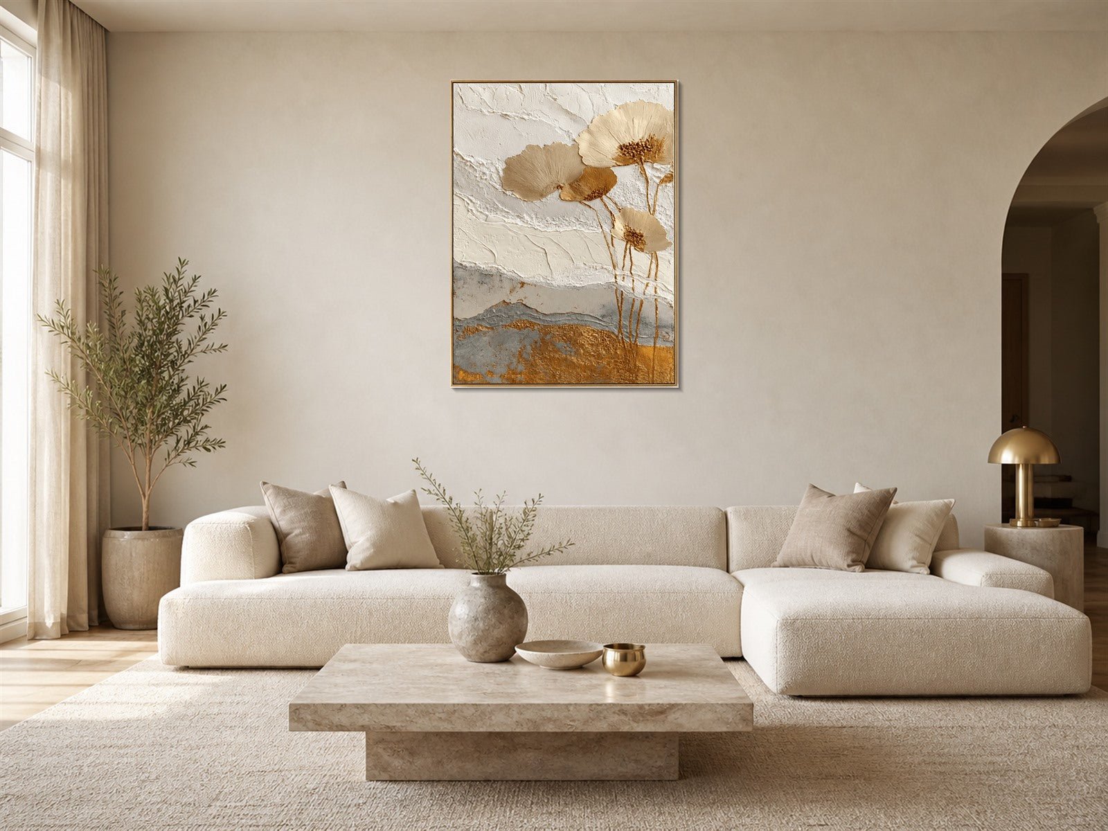 3D textured floral wall art with champagne gold flowers above a cream sofa in a quiet luxury living room