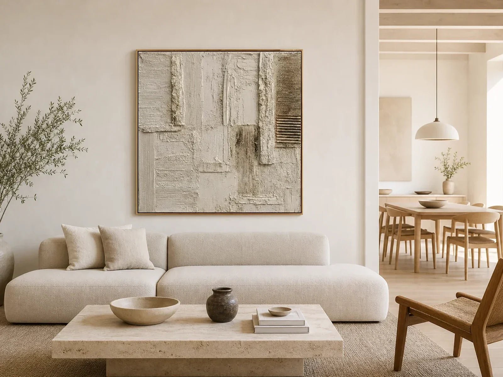 Hand-painted oatmeal and cream textured minimalist wall art above a linen sofa in an open-plan living room