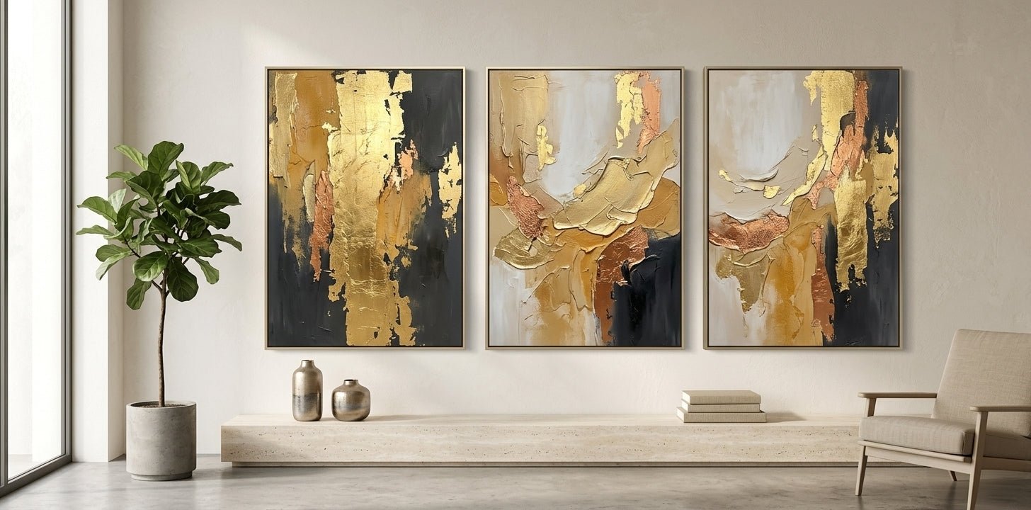 Modern luxury dining room featuring a grand vertical gold leaf abstract painting on a neutral-toned wall.