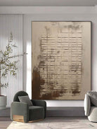 Large hand-painted modern abstract canvas painting with 3D plaster geometric grid texture in cement grey and rust brown by Eliot Vermeer for modern living room.