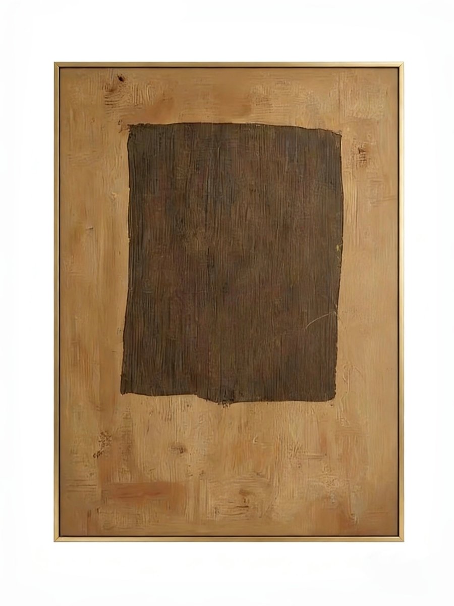 Large hand-painted abstract art by featuring a dark brown rectangle on a caramel ochre background with rich texture in a gold frame.