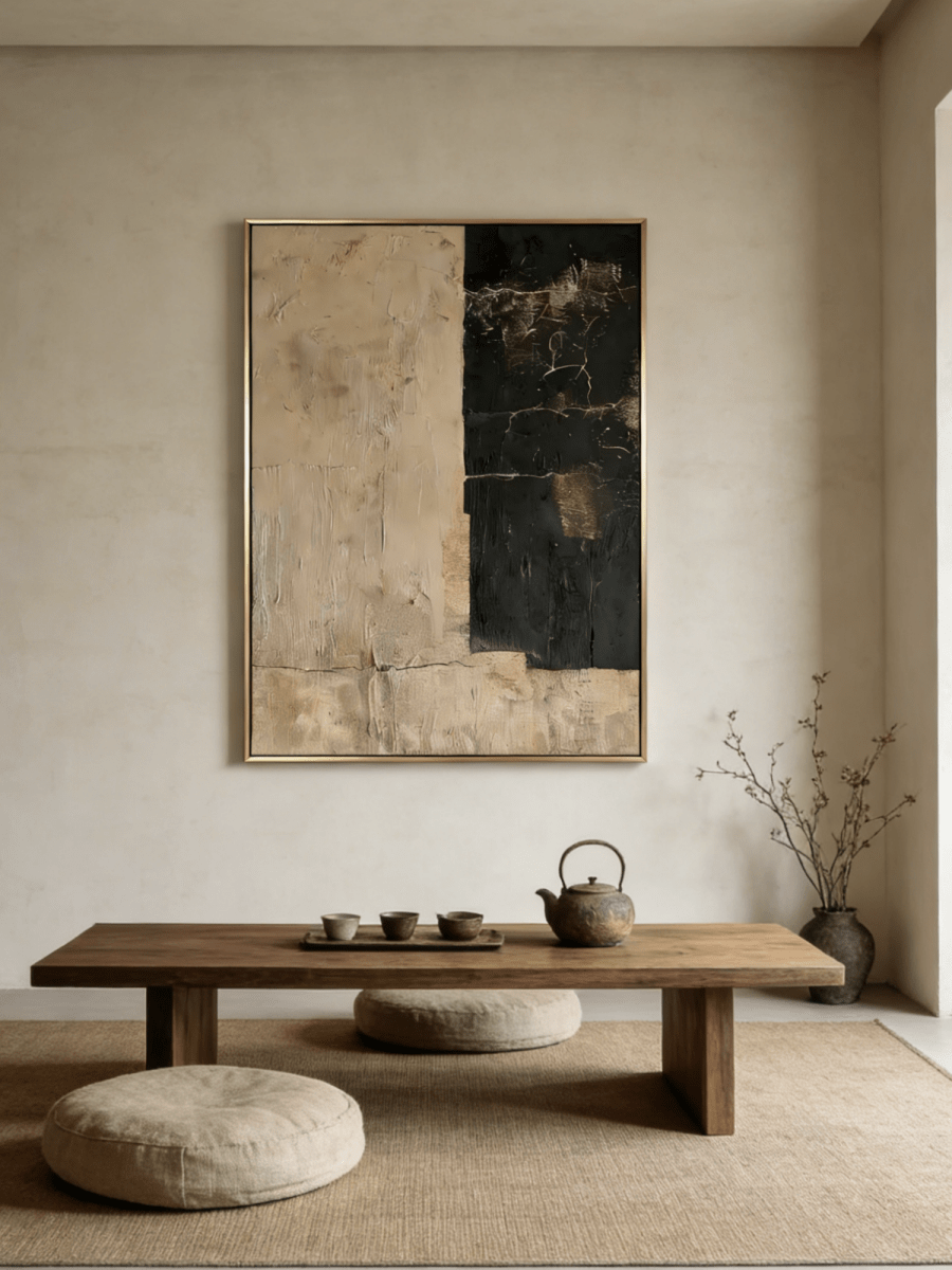 Large vertical hand-painted abstract painting with black and beige color blocks and heavy texture by Akari Kobayashi in a modern living room.