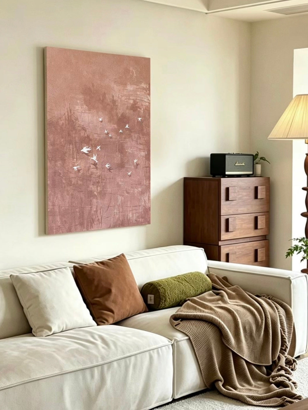 Hand-painted abstract bird wall art featuring white birds in flight over a textured blush pink and taupe background, contemporary canvas artwork for modern living room and bedroom decor.