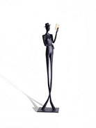abstract male figure reading a gold book, 51cm tall matte black metal sculpture for home office shelf decor