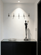 abstract male figure reading a gold book, 51cm tall matte black metal sculpture for home office shelf decor