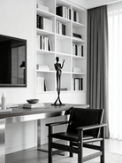 abstract male figure reading a gold book, 51cm tall matte black metal sculpture for home office shelf decor