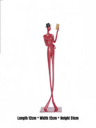 abstract male figure reading a gold book, 51cm tall matte red metal sculpture for home office shelf decor