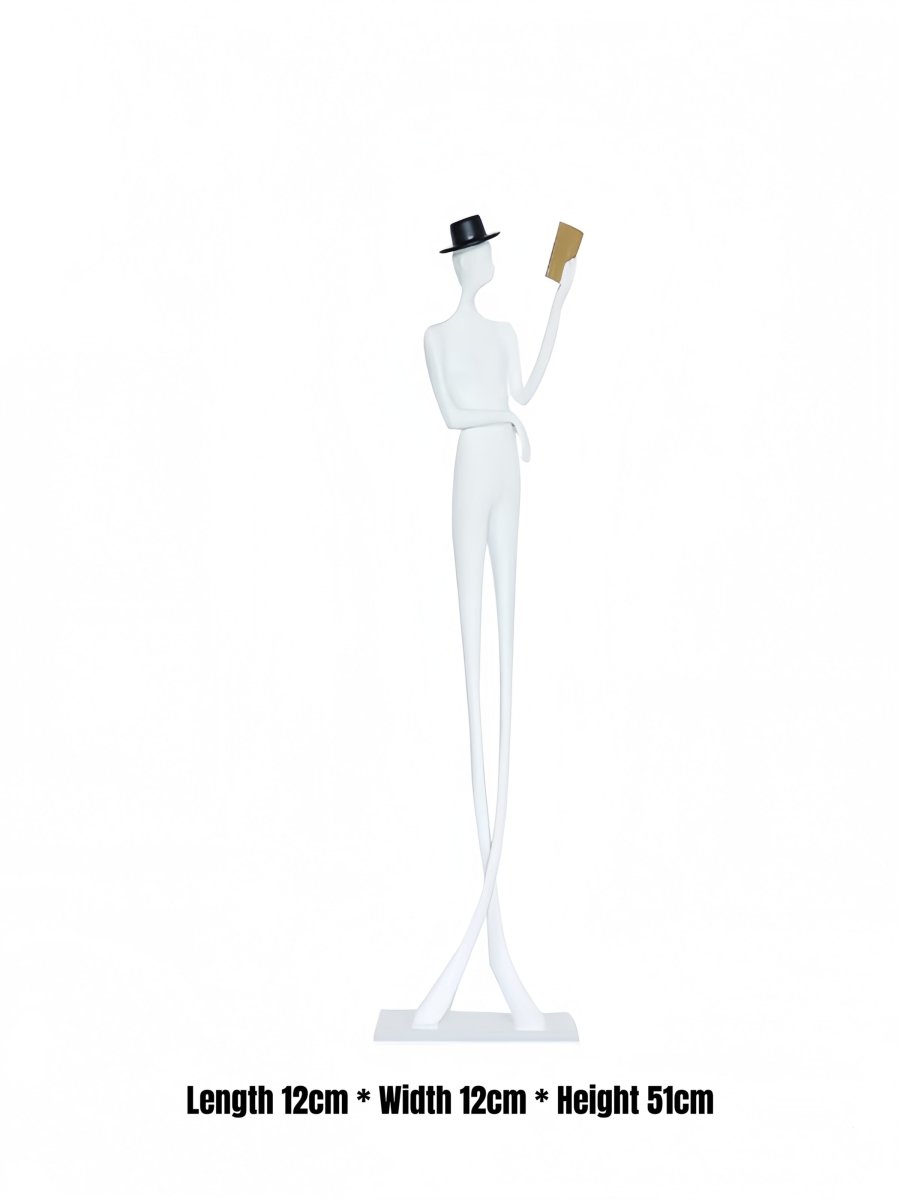 abstract male figure reading a gold book, 51cm tall matte white metal sculpture for home office shelf decor