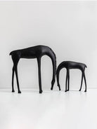 Modern minimalist drinking horse sculpture in matte black metal– elegant home decor for shelf, console, or desk styling