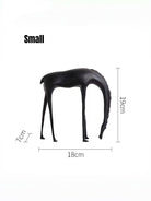 minimalist matte black metal horse sculpture standing on black decorative books, modern Nordic shelf decor