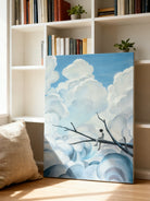 Modern abstract dreamy tree and heart clouds diptych canvas art displayed on a living room wall