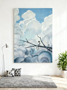 Dreamy heart cloud and tree silhouette wall art displayed in a modern living room, creating a whimsical home decor atmosphere.