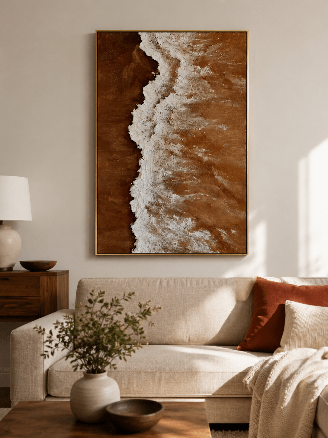Vertical textured beach painting displayed in an organic modern room