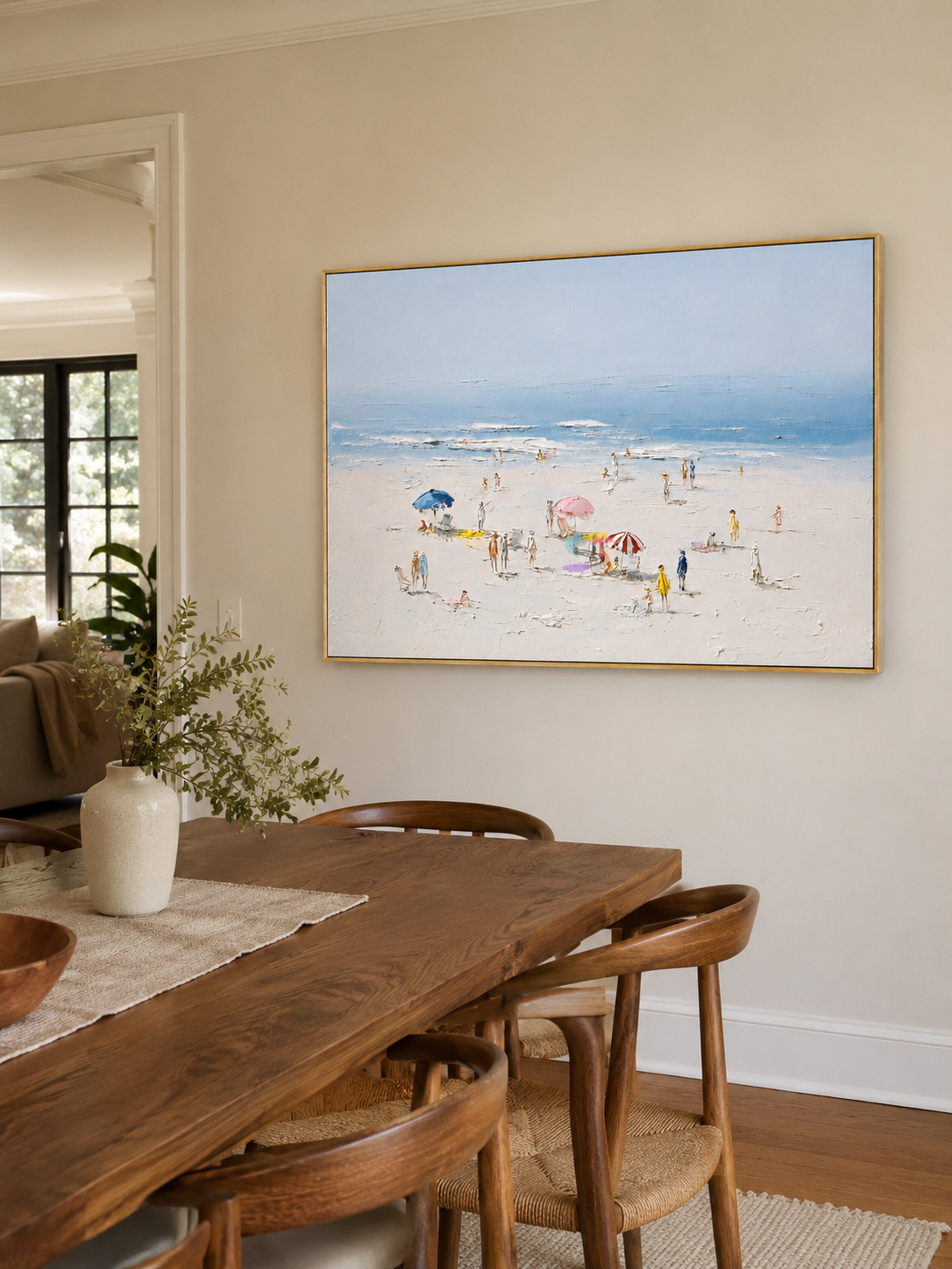 Modern coastal wall art featuring a pale blue ocean and bright sandy beach