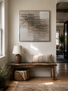 Modern relief wall art with weathered geometric blocks in earth tones