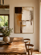 Hand-painted geometric abstract wall art displayed in a modern open-plan dining room