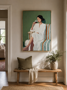 Hand painted figurative canvas of an elegant seated woman holding a wine glass