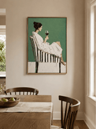 Woman with wine painting styled in a contemporary dining room interior