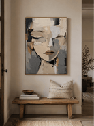 Contemporary abstract woman portrait displayed above a modern entryway console