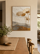3D textured botanical wall art displayed in an elegant cream and grey dining room