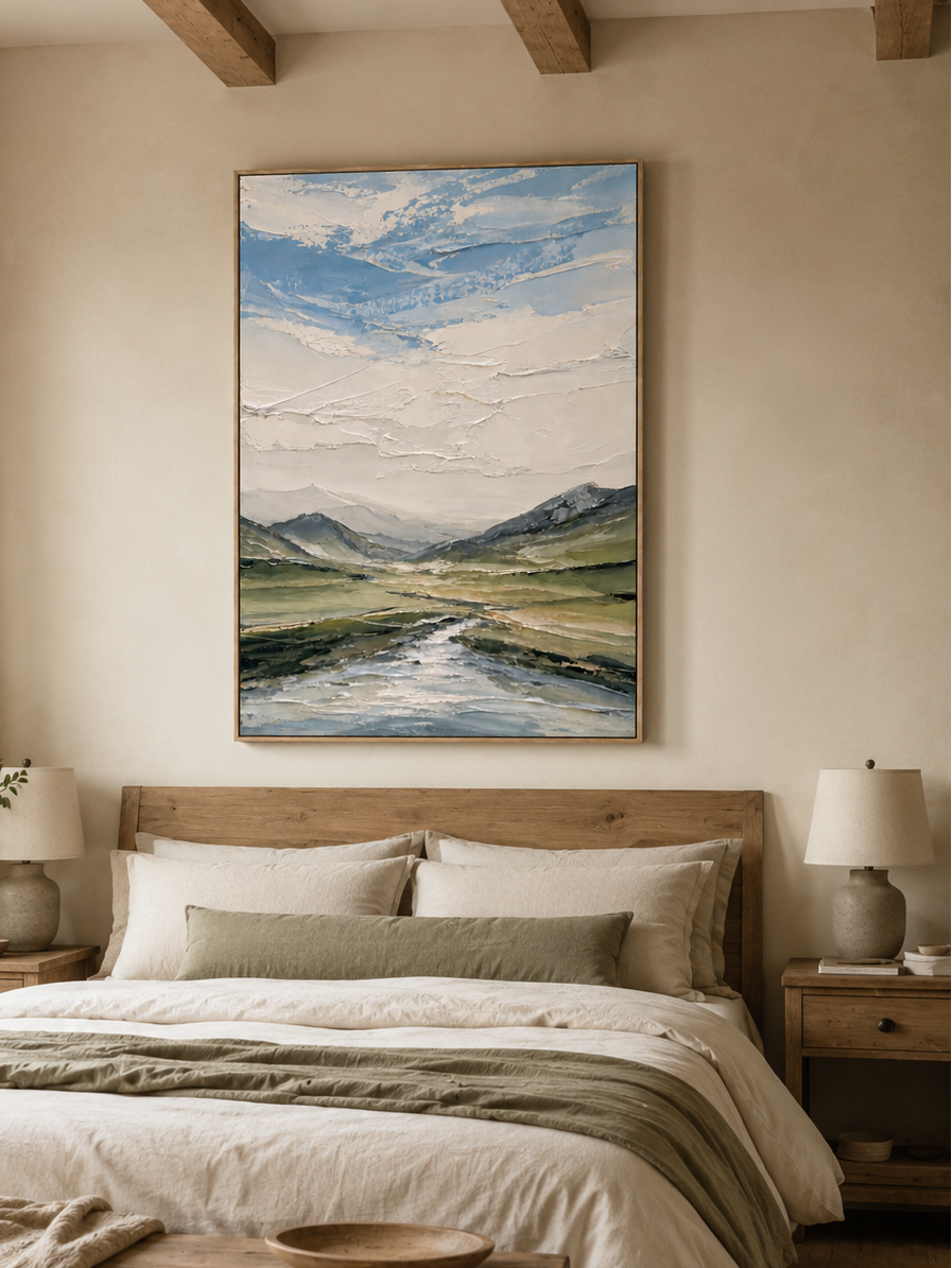 Blue and sage green textured landscape wall art displayed in a calm neutral bedroom above the bed