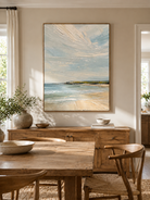 Hand-painted textured ocean wall art displayed in a modern open-plan dining room with neutral decor