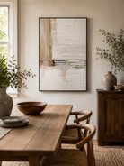 Hand-painted beige textured abstract wall art displayed in a modern dining room with natural wood decor