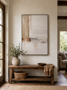 Organic modern neutral abstract painting displayed above a wood console in a minimalist entryway