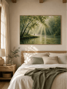 Green woodland landscape with golden sunlight displayed above the bed in a calm neutral bedroom