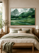 Peaceful mountain meadow wall art displayed above the bed in a nature-inspired bedroom