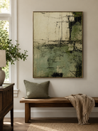 Vertical sage green abstract wall art displayed above a console table in a modern entryway