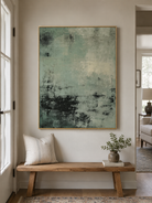 Modern sage green abstract wall art displayed above a console table in an entryway