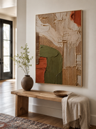 Hand-painted textured geometric canvas displayed above an entryway console in a wabi-sabi foyer