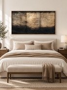 Panoramic black beige and champagne textured painting displayed above the bed in a warm contemporary bedroom