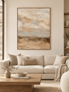 Large vertical neutral abstract landscape wall art displayed in a cream organic modern living room