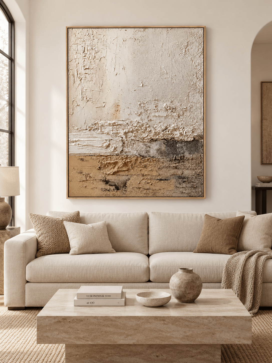 Large Wabi Sabi textured abstract wall art displayed above a sofa in a warm neutral modern living room