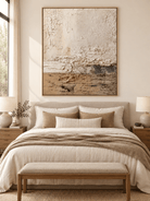 Neutral beige textured abstract painting displayed above a bed in a minimalist Wabi Sabi bedroom