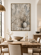 Hand-painted textured floral still life wall art displayed in a modern open-plan dining room