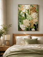 Textured green and cream floral painting displayed in a warm neutral contemporary bedroom