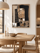 Hand-painted contemporary abstract wall art in earthy neutrals displayed in an open-plan dining room