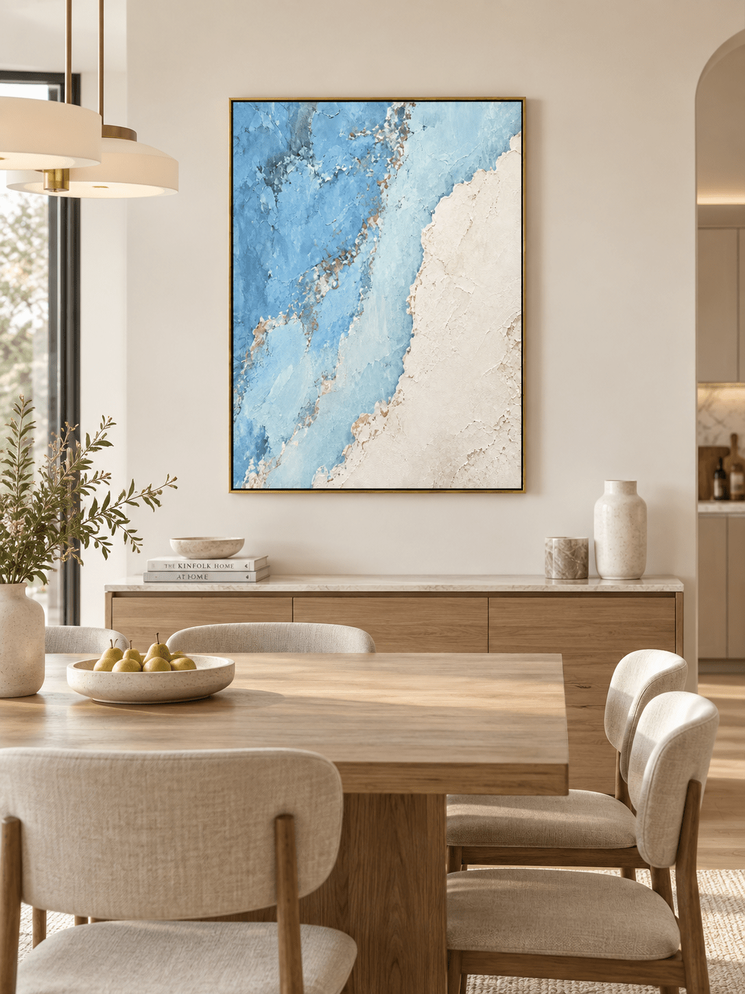 Hand-painted abstract coastline wall art displayed in a contemporary open-plan dining room