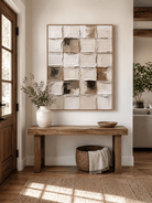 Vertical neutral textured geometric wall art displayed above an entryway console in a Japandi-inspired interior