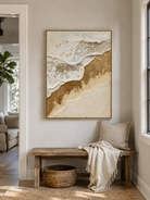 Vertical white and gold textured wall art displayed above a modern entryway console
