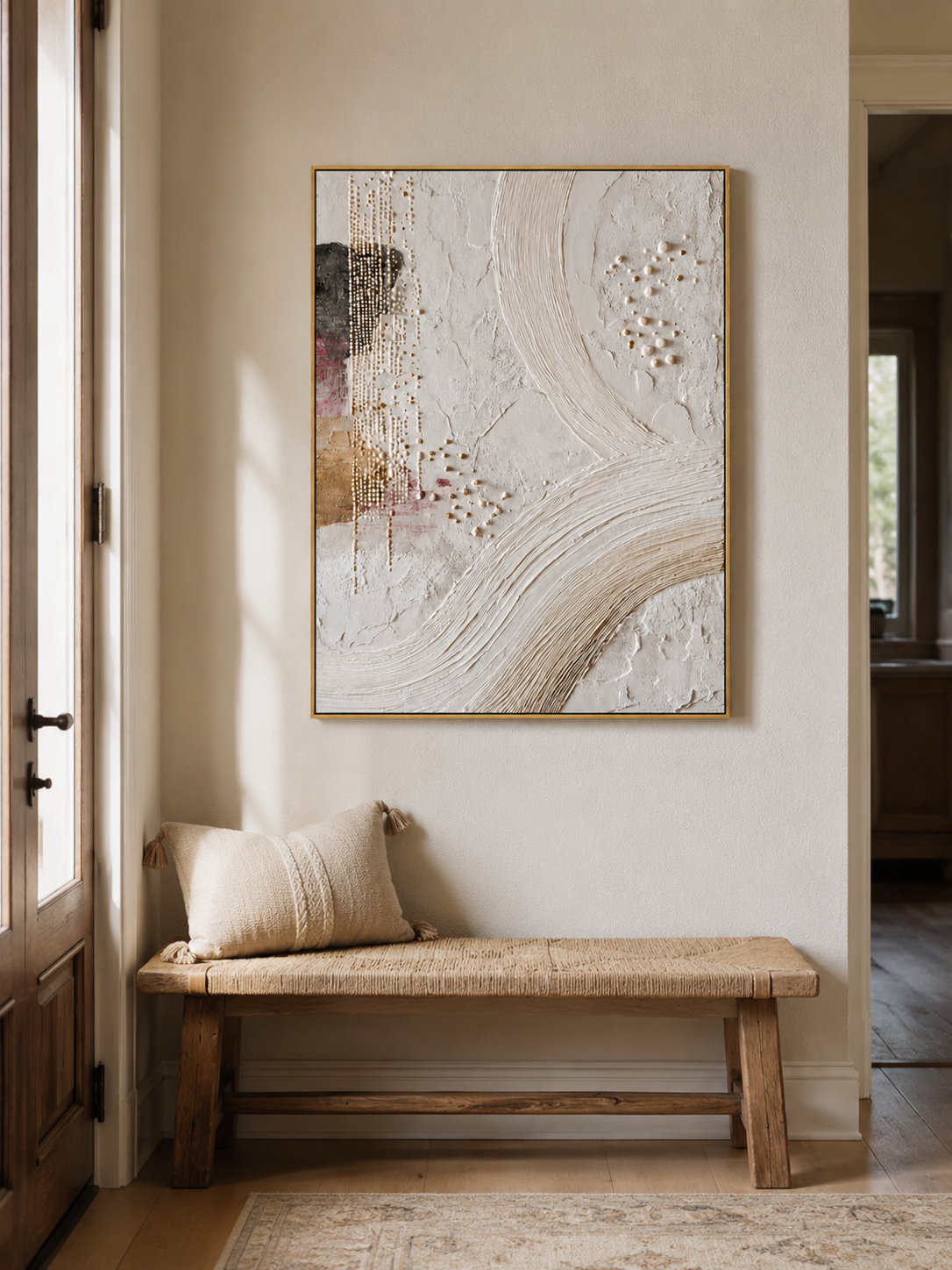 Vertical ivory textured wall art displayed above a console table in a contemporary entryway
